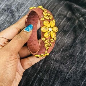 Elegant Gold and Brown Floral Bracelet